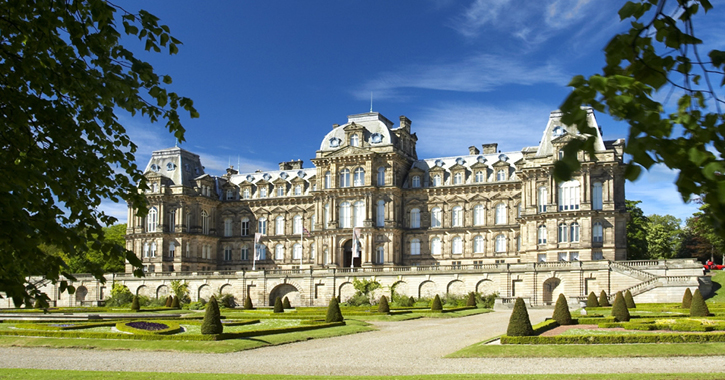The Bowes Museum and surrounding grounds on a sunny day